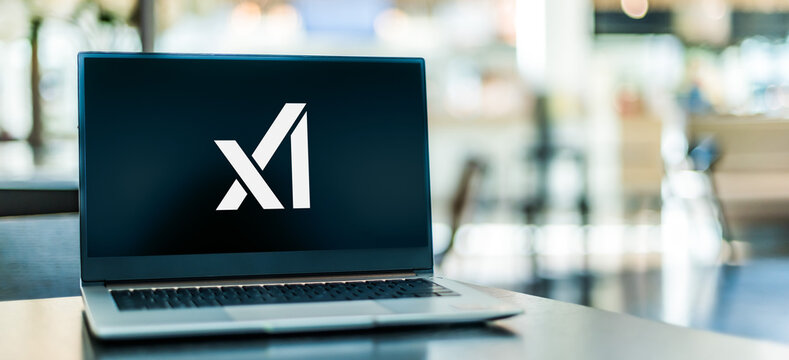Laptop computer displaying logo of X.AI Corp