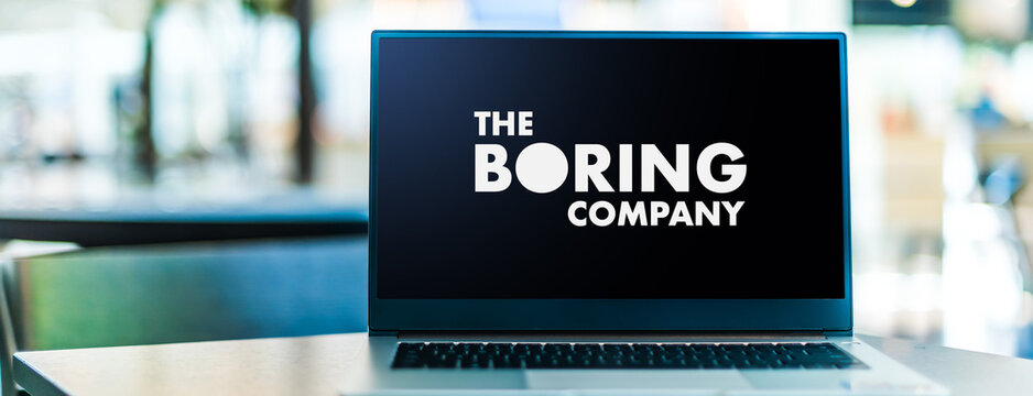 Laptop computer displaying logo of The Boring Company
