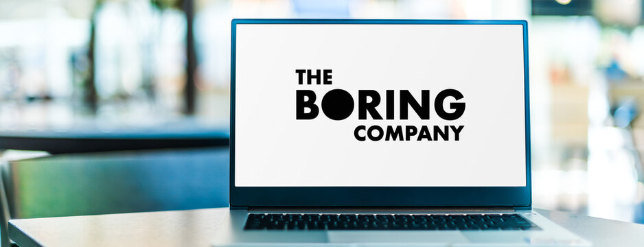Laptop computer displaying logo of The Boring Company