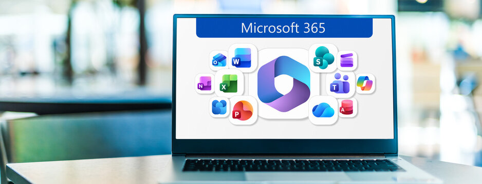 Laptop computer displaying logos of Microsoft 365