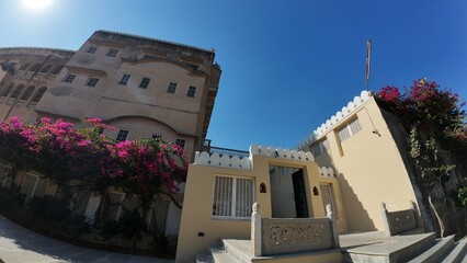 Panoramic View of the Grand Open Courtyard Inside Mandawa Fort Featuring Massive Heritage Walls and Garden Landscaping in Rajasthan
