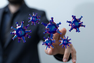 Abstract image of a person touching simulated virus particles, representing infection and disease control. Cov