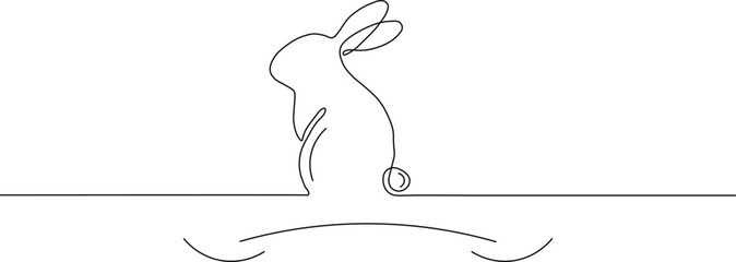A minimalist continuous line drawing of a rabbit standing on its hind legs, depicted in elegant black lines on a clean white background, capturing simplicity and grace. © mohammad