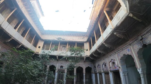 Detailed View of Medieval Period Haveli Interior Walls with Ornate Fresco Murals and Traditional Patterns, Nawalgarh Rajasthan, India 