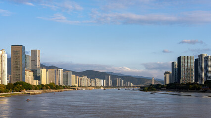 Urban Skyline with River and Skyscrapers
