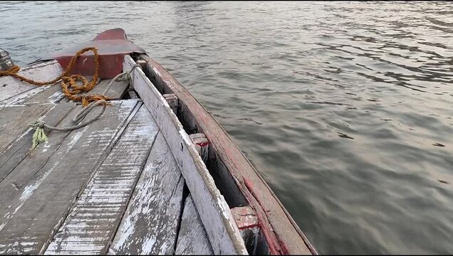 World famous various Ganga river view from motor boat running, Spiritual Ganga river wide view during evening time at old Varanasi city