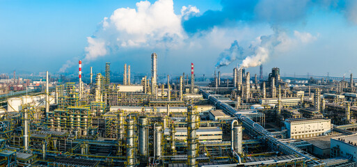 Aerial shot of a large chemical plant and oil refinery with pipeline equipment in industrial area