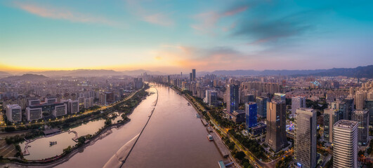 Aerial View of Urban Skyline at Sunset