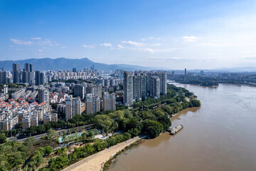 Aerial View of Urban Riverfront Skyline