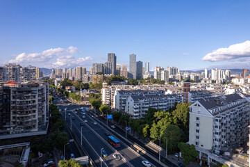 Urban Skyline with High-Rise Buildings and Road Traffic