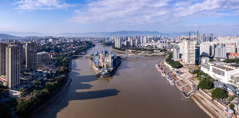 Aerial view of urban river with modern architecture