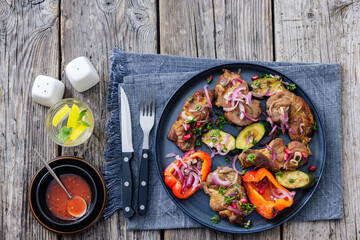 Grilled pork neck chunks with roasted veggies