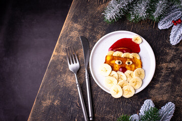 Pancakes in the shape of Santa Claus