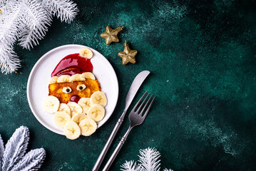 Pancakes in the shape of Santa Claus