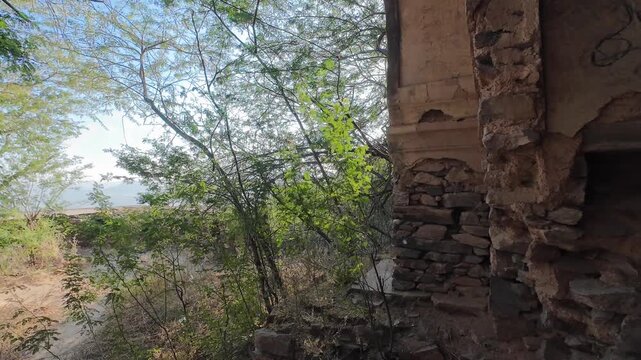 Historic Ruins of the 18th Century Deogarh Fortress Showcasing Crumbling Rajputana Architecture and Wild Foliage Reclaiming the Deserted Palace Walls