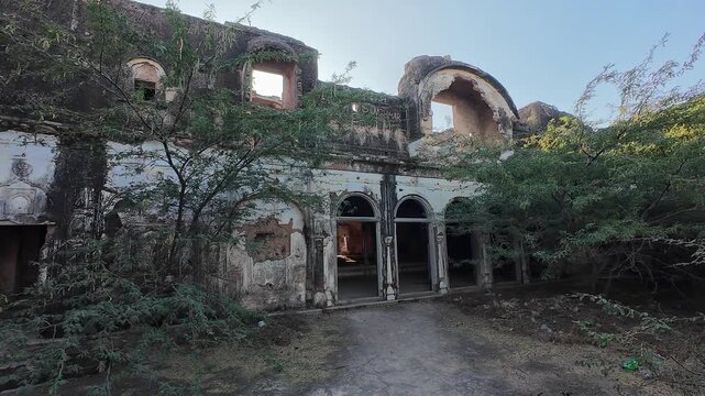 Historic Ruins of the 18th Century Deogarh Fortress Showcasing Crumbling Rajputana Architecture and Wild Foliage Reclaiming the Deserted Palace Walls