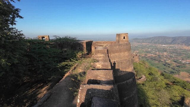 Exploring the Historic Fortress of Deogarh Featuring Weathered Stone Fortifications and Strategic Defensive Structures on a Rugged Hilltop Landmark, Sikar, Rajasthan