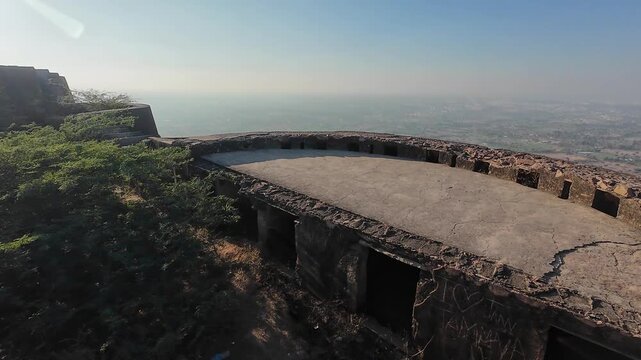 Exploring the Historic Fortress of Deogarh Featuring Weathered Stone Fortifications and Strategic Defensive Structures on a Rugged Hilltop Landmark, Sikar, Rajasthan