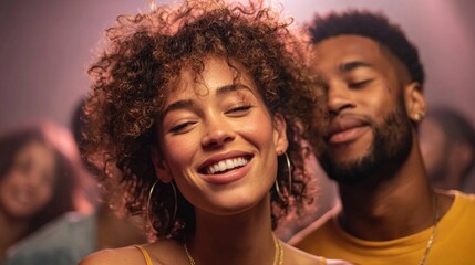 Happy couple enjoying a night out at a party, smiling and laughing together