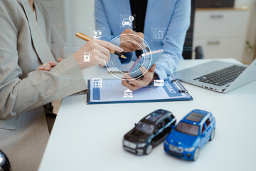 Female signing car insurance document or lease. Writing signature on contract or agreement. Buying or selling new or guarantee.