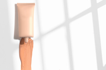 foundation primer cream lotion cosmetic for makeup, product mockup packaging tube bottle in flat lay close-up view