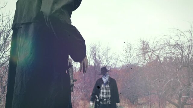 Classic western duel, cowboys standing off in a rural scene. Two men wearing dusters and hats engaging in a classic cinematic old west showdown gun draw.