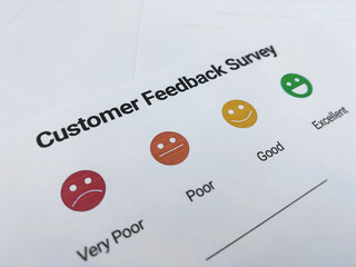 Customer Feedback survey showing options to choose from on the paper, rating, review, satisfaction, business.