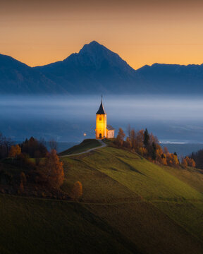 Misty Slovenian Landscape in over Jamnik Church