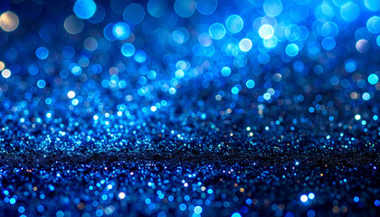 大小の玉ボケと青いグリッターが煌めく華やかな背景