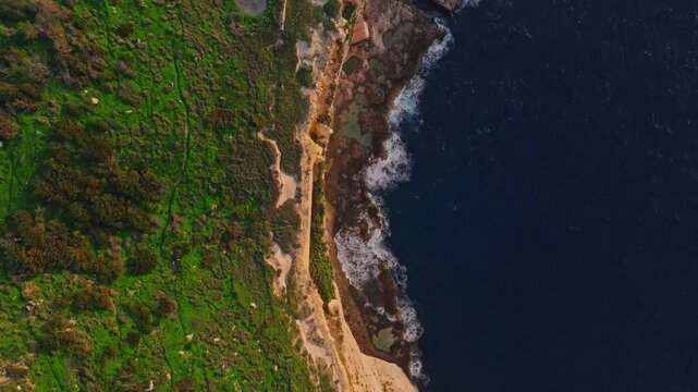 Drone top view of famous sunset spot. Countryside, rocks. Dingli cliffs, Mediterranean sea, Malta 