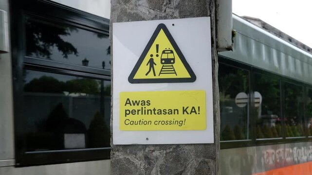 caution train caution sign, Java, Indonesia, South East Asia