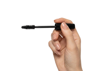 Hand holding mascara brush