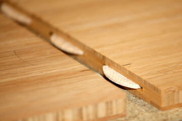 Wooden joiners in a shelf