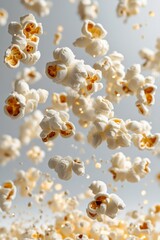 floating buttered popcorn with cinema light effect, isolated on white background