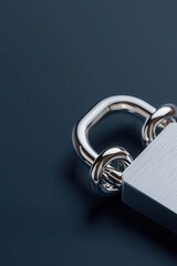 Close-up of a silver metallic padlock on a dark background representing security, protection, and privacy in modern technology and data safety concepts.