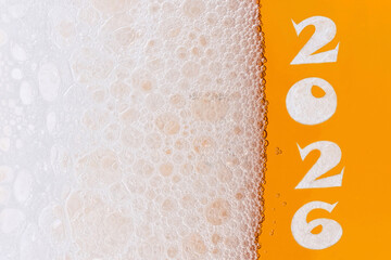 Happy New Year 2026 - inscription on a glass of beer