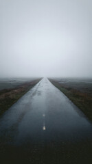 Misty road journey foggy landscape photography serene environment wide angle adventure concept