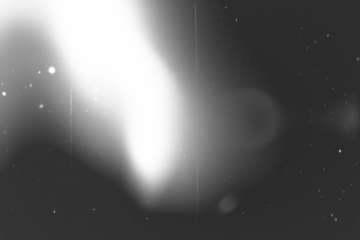 retro film overlay effect with scratch dust and light leaks, retro grain noisy film distressed texture light leak flare on black background,black and white abstract light background