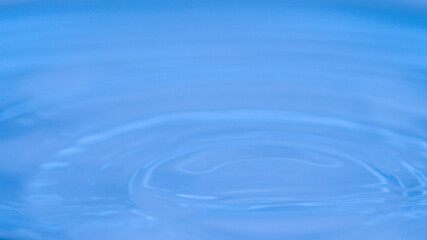 The calming effect of ripples spreading across the water's surface, inviting tranquility and reflection.