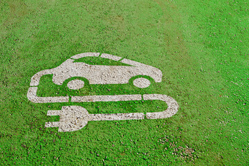 A sign for an electric car charging station