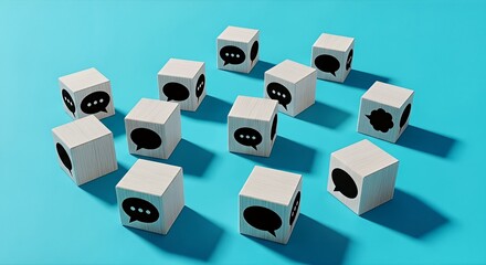 A collection of wooden cubes featuring various black speech bubbles and chat icons representing communication, dialogue, and conversation concepts on a bright blue background