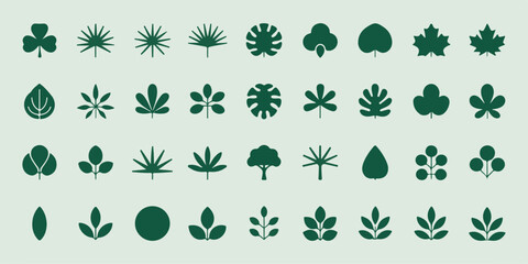collection of various green leaf and tree icons on a light green background representing nature and growth