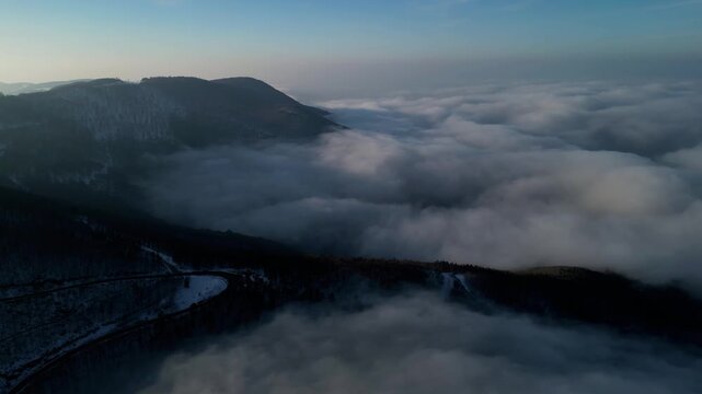 Cinematic aerial drone view above winter clouds in Kocadag, Samsun, Turkey