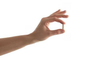 Hand holding a white pill between thumb and index finger isolated on a transparent background