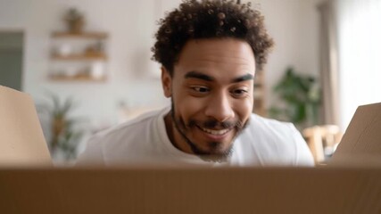 Excited Amazed Man Opening a Delivery Box, Unpacking a Long-Awaited Parcel