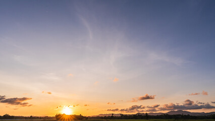 Sky dusk dramatic background, Summer season gold sunset landscape nature light clouds blue orange yellow color, Colorful sunrise sun cloud beauty, Mountain horizon beautiful sunlight weather sunshine