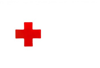 Fototapeta premium Close-up of a red medical cross symbol on a white background, injury, hospital