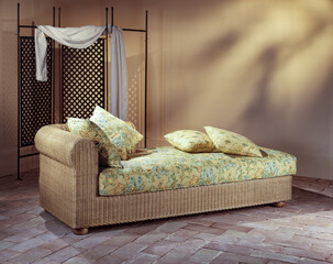 Single shot photo of a room with a wicker sofa