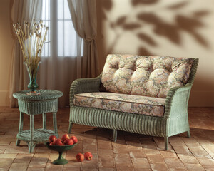 Single shot photo of a room with a wicker sofa