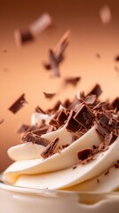 A creamy dessert topped with chocolate shavings, creating an appetizing and indulgent presentation